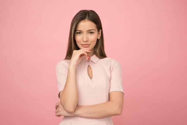 Beautiful Woman in Pink Background