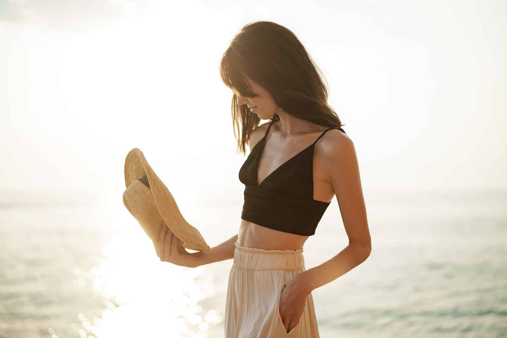 Young smiling woman outdoors portrait at beach