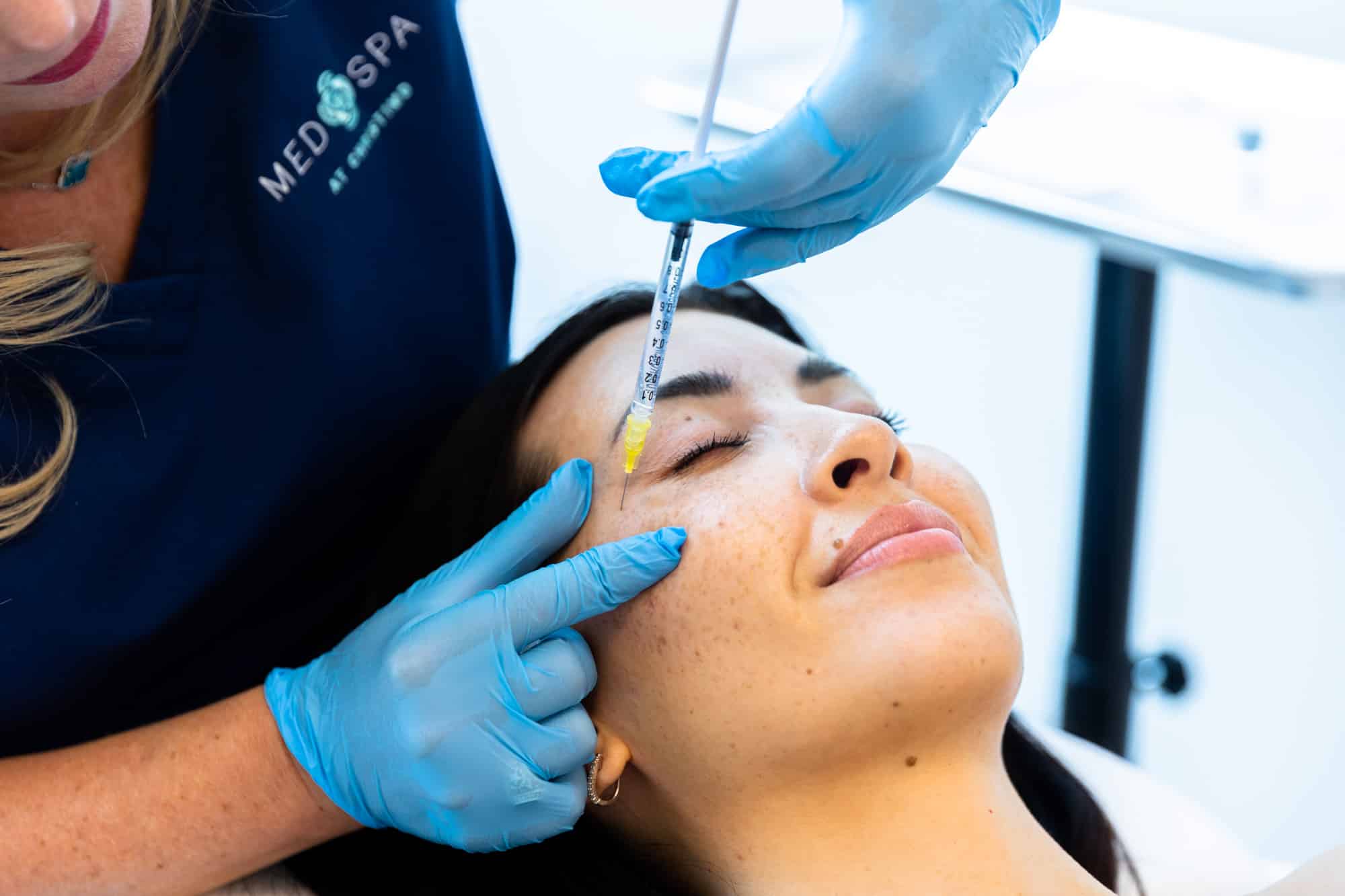 Dr. Christi Injecting Neurotoxin in Patient's Cheek