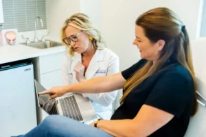 Christi MD consults with a Houston patient about bladder sling surgery.